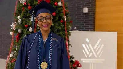 Wake Tech student process into the auditorium for the Fall 2025 commencement ceremony.