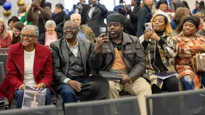 Wake Tech student process into the auditorium for the Fall 2025 commencement ceremony.