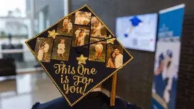 Wake Tech student process into the auditorium for the Fall 2025 commencement ceremony.