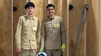 A female student in front of a computer at 2026 SkillsUSA North Carolina State Leadership & Skills Conference.