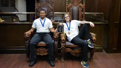 A female student in front of a computer at 2026 SkillsUSA North Carolina State Leadership & Skills Conference.