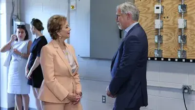 U.S. Education Secretary Linda McMahon talks with Wake Tech President Dr. Scott Ralls during a June 25, 2025, visit.