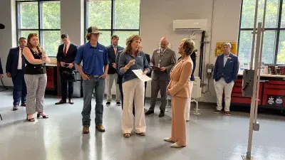 U.S. Education Secretary Linda McMahon talks with Wake Tech President Dr. Scott Ralls during a June 25, 2025, visit.