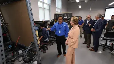 U.S. Education Secretary Linda McMahon talks with Wake Tech President Dr. Scott Ralls during a June 25, 2025, visit.