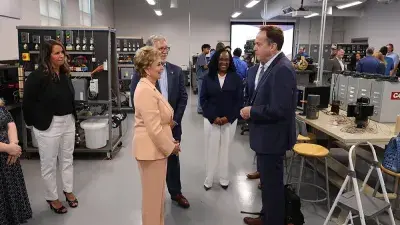 U.S. Education Secretary Linda McMahon talks with Wake Tech President Dr. Scott Ralls during a June 25, 2025, visit.