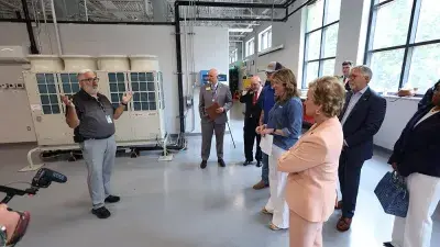 U.S. Education Secretary Linda McMahon talks with Wake Tech President Dr. Scott Ralls during a June 25, 2025, visit.