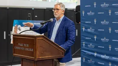 Wake Tech President Dr. Scott Ralls speaks at the ceremony announcing the NCAB Broadcast Technology Academy to train radio engineers at the college.