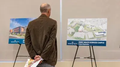 Wake Tech President Dr. Scott Ralls speaks at the groundbreaking for the Perry Family Simulation Hospital.