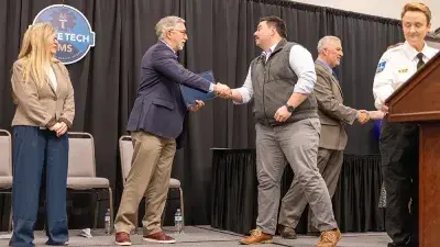 Wake Tech President Dr. Scott Ralls speaks to students who completed the non-degree Emergency Medical Technician–Paramedic program.