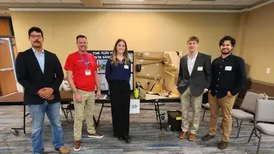Over-Engineers won first place in the Rube Goldberg Machine Competition., 