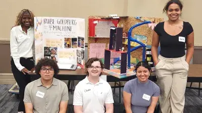 Over-Engineers won first place in the Rube Goldberg Machine Competition., 