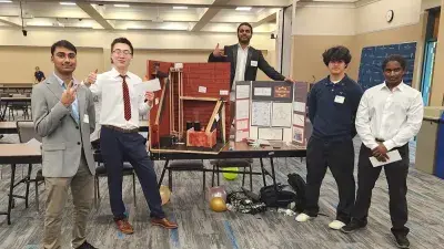 Over-Engineers won first place in the Rube Goldberg Machine Competition., 
