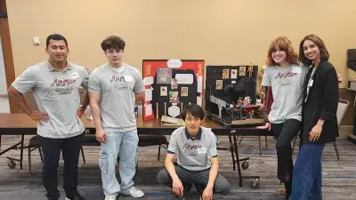 Over-Engineers won first place in the Rube Goldberg Machine Competition., 
