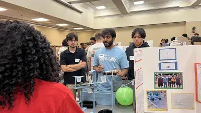 Over-Engineers won first place in the Rube Goldberg Machine Competition., 
