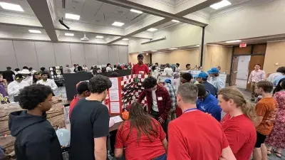 Over-Engineers won first place in the Rube Goldberg Machine Competition., 