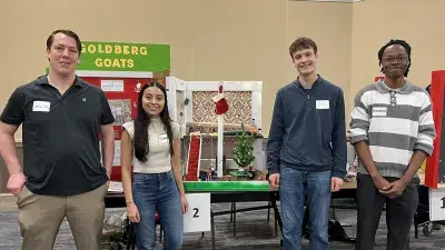 Over-Engineers won first place in the Rube Goldberg Machine Competition., 