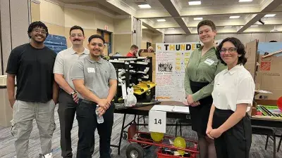 Over-Engineers won first place in the Rube Goldberg Machine Competition., 