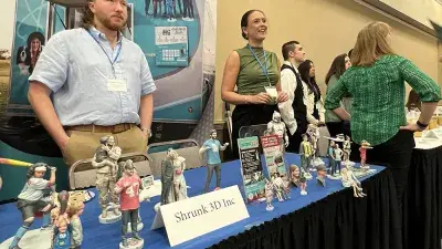 Business Administration students showcase projects designed to help area small businesses.