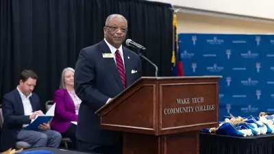 Wake County Commissioner Don Mial speaks during Wake Tech's Phi Theta Kappa induction ceremony.