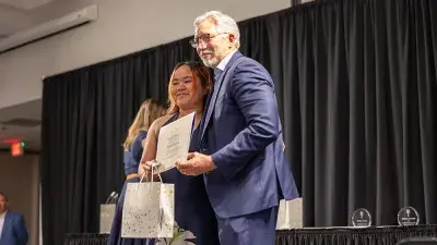 Wake Tech President Dr. Scott Ralls speaks to students and guests at Student Leadership and Torch Awards ceremony