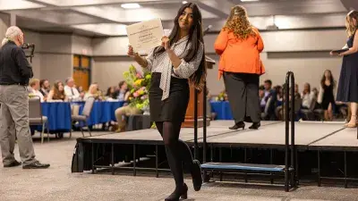 Wake Tech President Dr. Scott Ralls speaks to students and guests at Student Leadership and Torch Awards ceremony