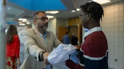 Wake Tech Biotechnology students show off their new lab coats.