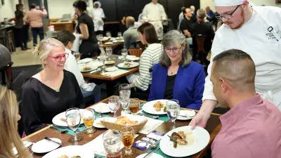 Chef Filippo Marini, right, created the menu for the "Ciao Down" fundraiser.