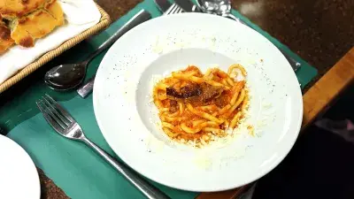 Chef Filippo Marini, right, created the menu for the "Ciao Down" fundraiser.