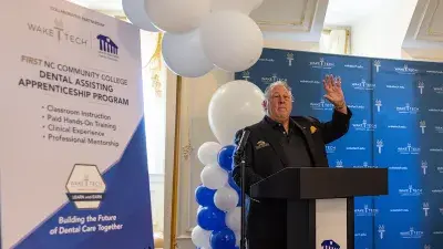 Dr. Don Lane of Lane & Associates Family Dentistry speaks during the apprenticeship ceremony.