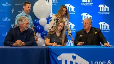 Dr. Don Lane of Lane & Associates Family Dentistry speaks during the apprenticeship ceremony.