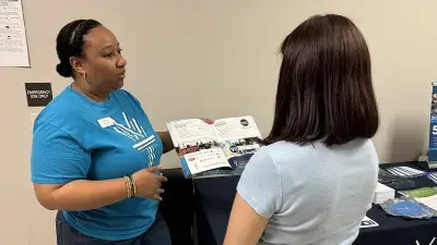 Wake Tech staff and students provide information about the college's programs and services to Spanish-speaking adults during the Open House en Español.