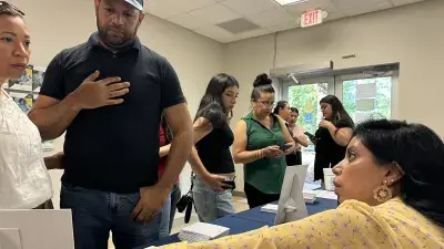 Wake Tech staff and students provide information about the college's programs and services to Spanish-speaking adults during the Open House en Español.