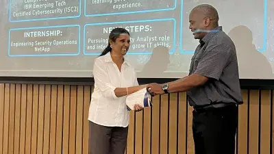 Anthony Lucas, head of Wake Tech's Cybersecurity program, speaks at a ceremony honoring the first cohort of students to complete the Sentinel Cybersecurity Bootcamp.