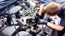 Student working on engine