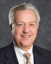 Mr. Geoffrey J. Lang